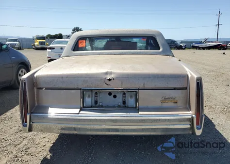 1990 Cadillac Deville из США, поврежденный, VIN 1G6CD1332L4210550